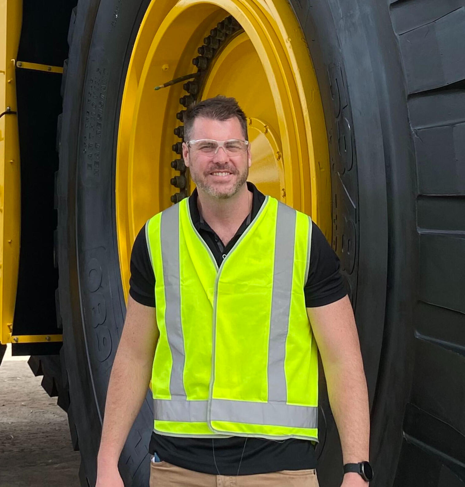 Jono Bradford Standing In Front Of Schlam Truck Jono Bradford Standing In Front Of Schlam Truck